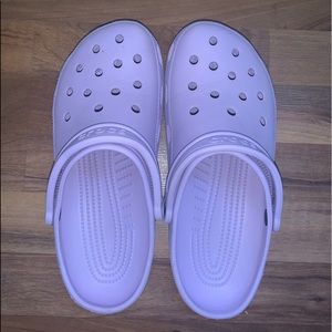 Purple crocs size 11 in W and size 9 in M
